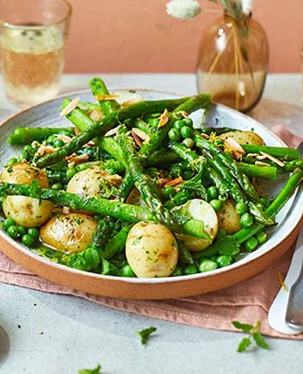 Asparagus with peas, mint & Jersey Royals in wild garlic butter