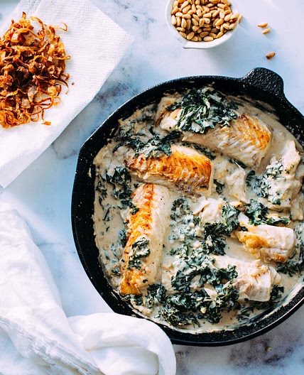 Fish and Kale in Tahini Sauce with crispy shallots