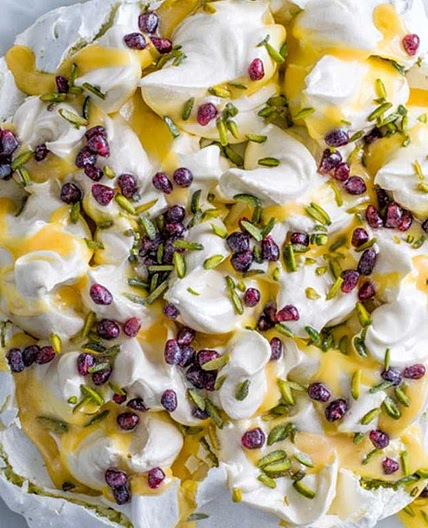 Saffron & pistachio pavlova with citrus curd