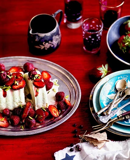 Pistachio ice-cream cake with red summer berries