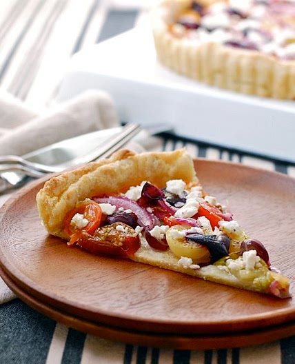 Tomato and Concord Grape Tart with a Cornmeal Black Pepper Crust