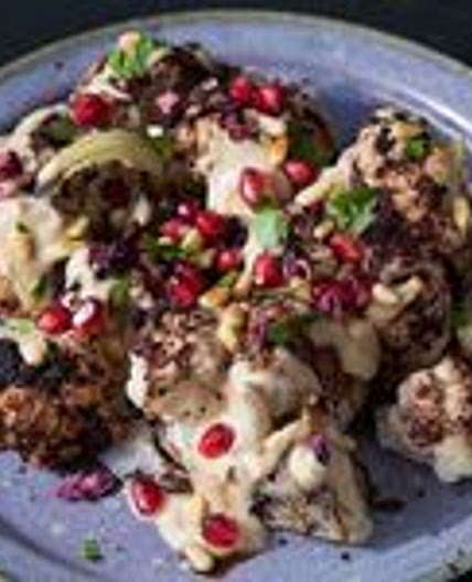Cauliflower Shawarma with Pomegranate, Tahini, and Pine Nuts