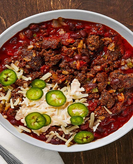 One-Pot Beef and Black Bean Chili with Spicy Crema and Monterey Jack Cheese