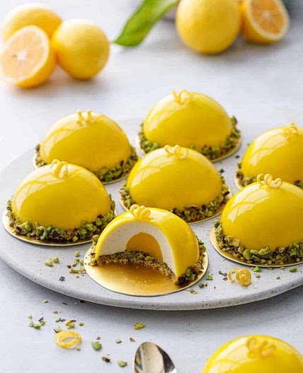 Pistachio & Meyer Lemon Mousse Cakes with Mirror Glaze