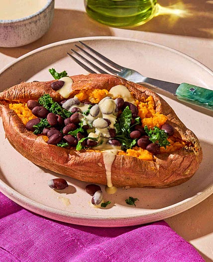 Stuffed Sweet Potato with Hummus Dressing