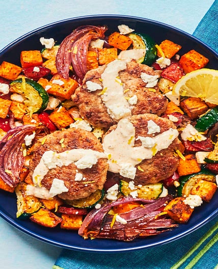Turkey Patties with Smoky Lemon Crema over a Bed of Roasted Veg