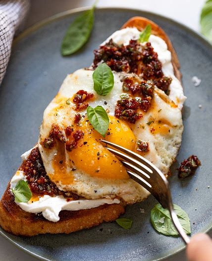 Goat Cheese Toast with Sun-Dried Tomatoes, Basil & Egg
