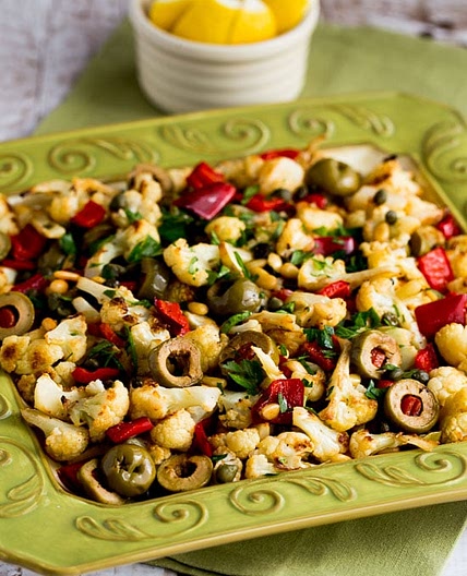 Roasted Cauliflower with Red Peppers, Green Olives, and Pine Nuts