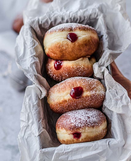 Classic jelly donuts with raspberry jam
