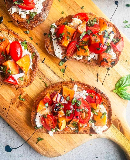 Burrata Bruschetta with Fresh Summer Peaches and Tomatoes