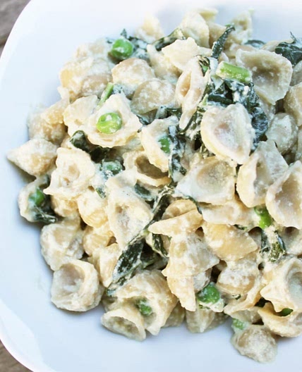 Creamy Pumpkin Seed Alfredo With Kale and Sweet Peas