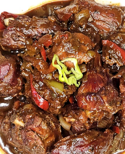 Jamaican Stewed Smoked Turkey Neck AKA "Ghetto Oxtail."