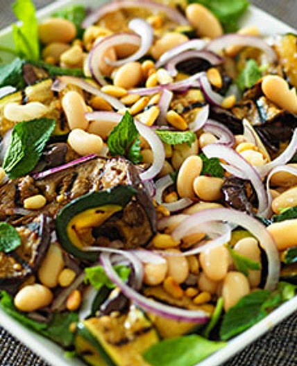 Minted aubergine with spinach and pine nuts