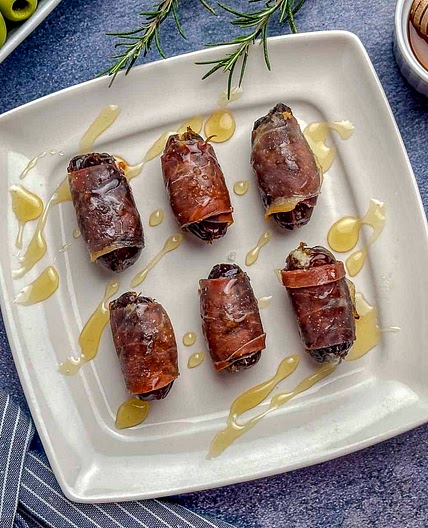 Prosciutto-Wrapped Dates with Blue Cheese and Honey