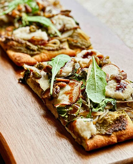 Pear and pistachio pizza