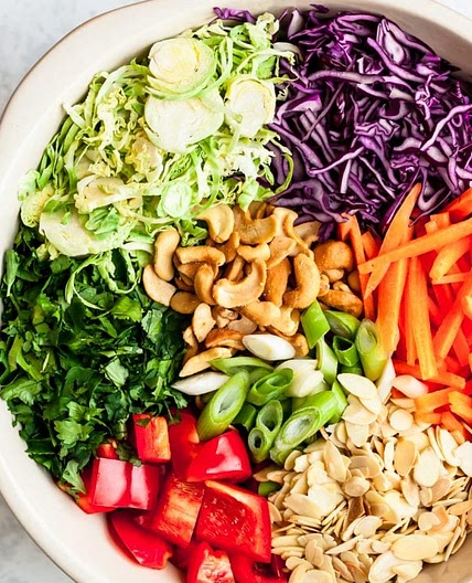 Cashew Crunch Shredded Brussels Sprouts Salad with Sesame Ginger Dressing