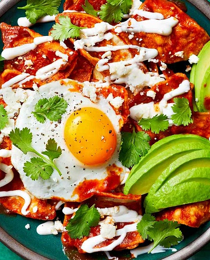 Chilaquiles Rojos with Fried Eggs and Cotija