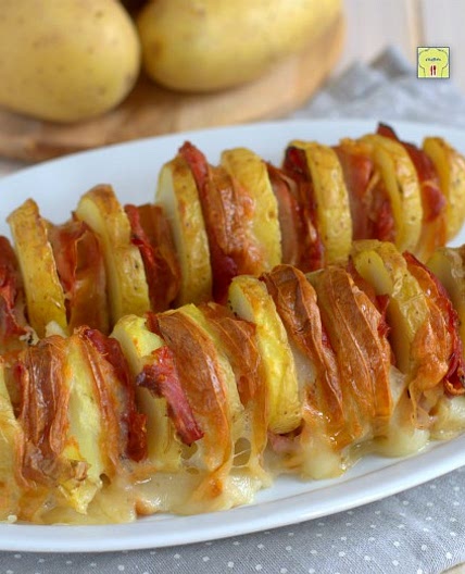 Spiedini di patate scamorza e speck