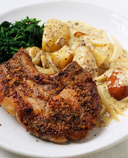 Pork chops with roasted pear, apple and new potatoes