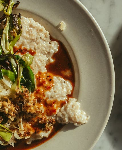 Vegan savoury oatmeal breakfast with mixed spices