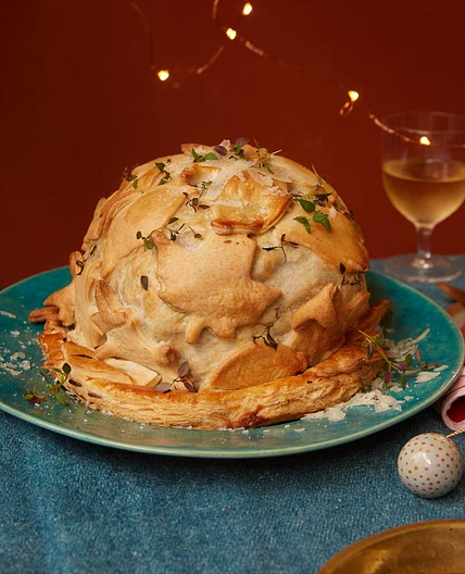 Whole roast cauliflower wellington with cheese sauce