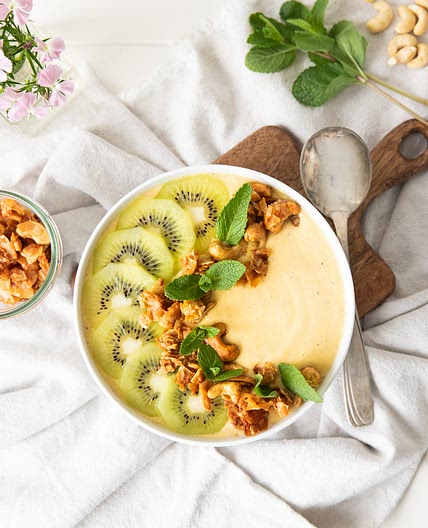 Honey-melon smoothie bowl with coconut granola