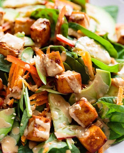 Marinated Tofu, Avocado, and Spinach Salad with Creamy Toasted Sesame & Soy Dressing