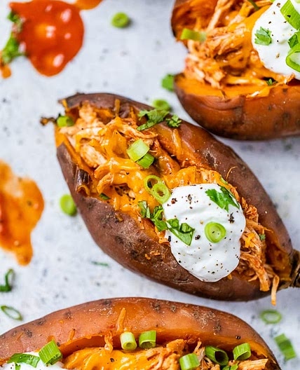 Slow Cooker Loaded Enchilada Chicken Stuffed Sweet Potatoes