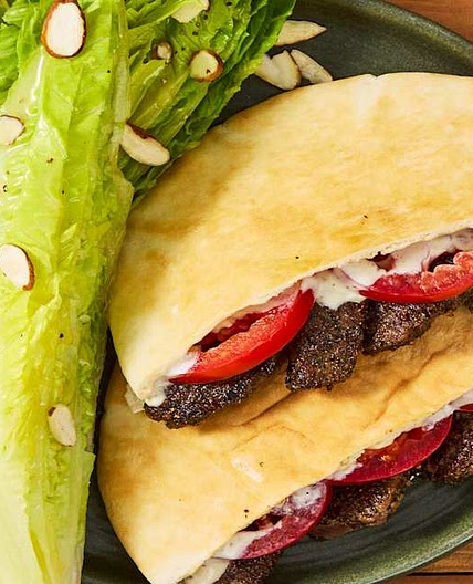 Garlicky Bavette Steak Pitas with Tomato, Lemony Wedge Salad & Almonds