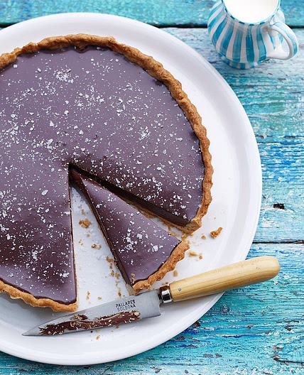 Rich chocolate tart with salt flakes