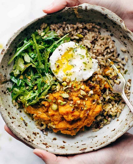 Healing Bowls with Turmeric Sweet Potatoes, Poached Eggs, and Lemon Dressing