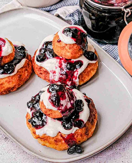 Papanasi: Sweet Cheese Donuts with Blueberry & Cream