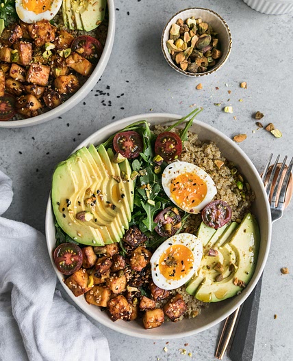 Quinoa Bowls with Sesame Tofu, Avocado, and Pistachios