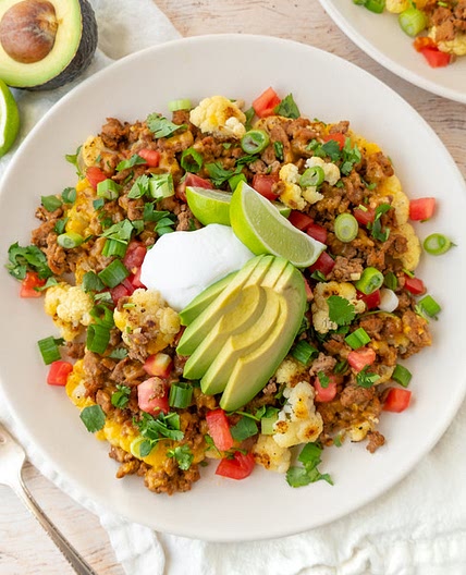 Cheesy Cauliflower Nacho Bites with Turkey, Cilantro, Avocado & Yogurt