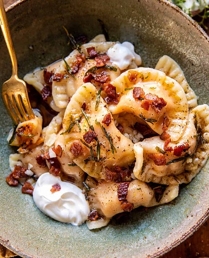 Sweet Potato Cheddar Pierogi with Bacon Bits