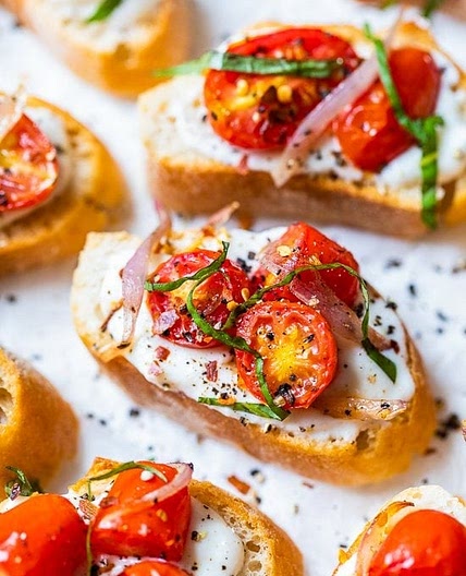 Whipped Ricotta Toast with Roasted Garlic, Tomatoes and Shallots
