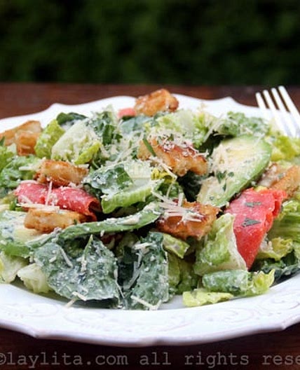 Caesar salad with smoked salmon and avocado