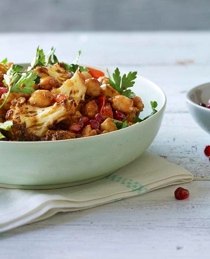 Warm spiced cauliflower and chickpea salad with pomegranate seeds