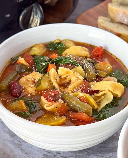 Easy Slow Cooker Tortellini Minestrone Soup with Pesto