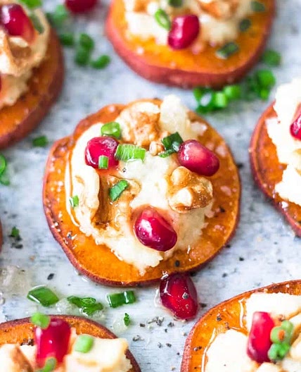 NC SweetPotato Rounds with Vegan Ricotta, Toasted Walnuts, Pomegranates and Chives