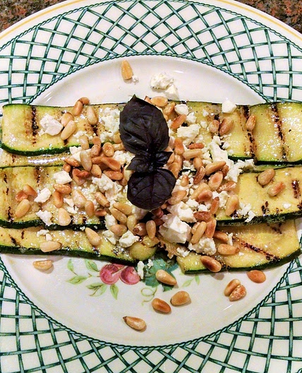 Grilled zucchini with feta and pine nuts