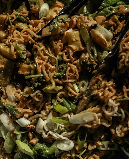 Fresh noodle salad with spicy peanut sauce