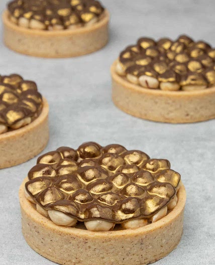 Triple Hazelnut Tart with Gold Chocolate decoration