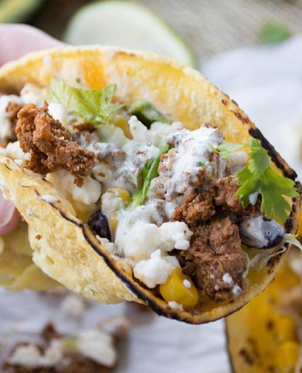Chorizo Tacos {with Black Bean & Corn Salsa and Cilantro-Lime Crema}