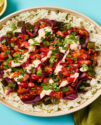 Saucy Chicken Burrito Bowls with Chicken Thighs, Charred Poblano, Smoky Crema & Cilantro Lime Rice