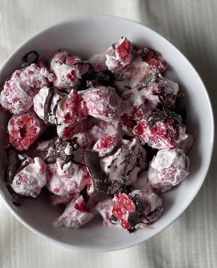 Easy Chocolate Covered Frozen Raspberries made with Yogurt
