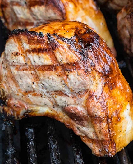 Grilled Double Cut Ribeye Pork Chops With Rosemary, Honey, and Lemon Glaze