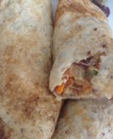 Pancakes filled with Carrots, Onions and Peas in Soft Cheese