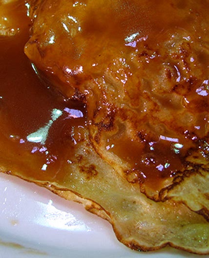 Apple-filled crepes with caramel sauce!