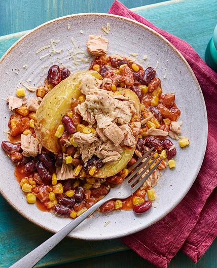 Microwave jacket potato with tuna and spicy beans